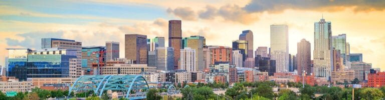 Panorama of Denver skyline at twilight.