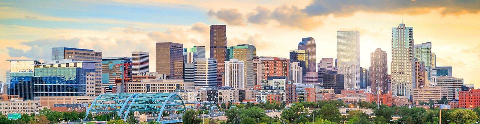 Panorama of Denver skyline at twilight.